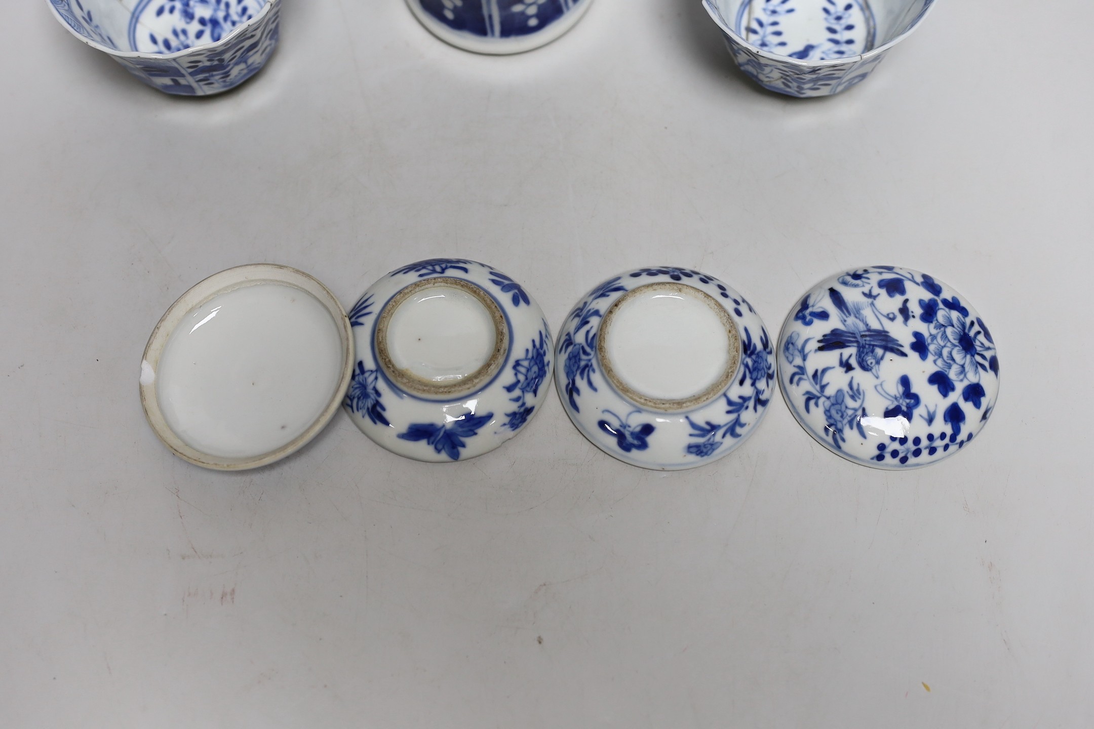 A Chinese blue and white phoenix decorated vase, a pair of circular boxes and a pair of damaged tea bowls. Late 19th century Tallest 17.5cm